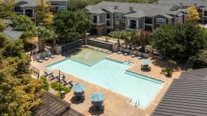 Apartments-in-Northwest-San-Antonio, TX-Elevated-View-of-Pool-and-Patio-Area